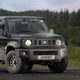 A photo of a black Suzuki Jimny SUV.